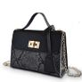Black snakeskin twist lock bag Image 3