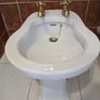 Bathroom sink, bath and bidet. Image 3