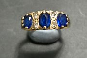 Sapphire and Edward Style Diamond ring.
