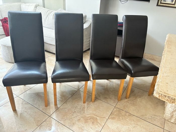 4 brown leather chairs
