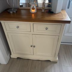 Cream and oak sideboard