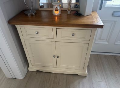 Cream and oak sideboard