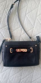 Coach mini swagger black pebble leather crossbody handbag