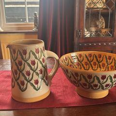 Nicholas MosseRed tulip set of two vintage items . A  7 and a half inch cylinder jug and a 9 inch diameter bowl. Can sell separately also