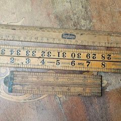 3 wooden rulers