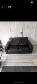 Free black two seater leather couch