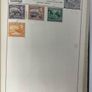 Collections: Green album from I suspect circa 1950's with used stamps from around the world. I have take picture of the 20odd pages and they go from sparse contents to complete. Image 9