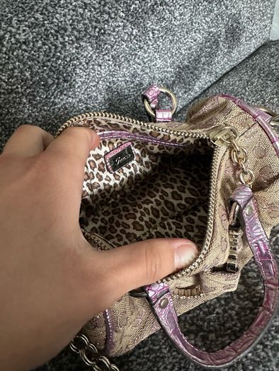 vintage Guess Y2K small monogram bag in a brown and pink glitter colorway.