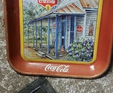 Coca cola metal drinks tray,used condition, see pictures for condition good solid used condition, nice display advertising item, buyer collects or pays postage thank you, sold as is ,front good ,back small bit of surface rust,,