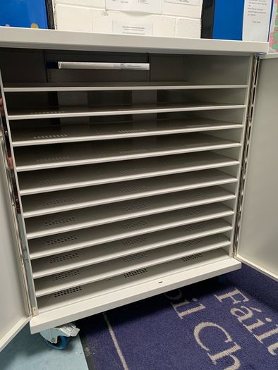 Large laptop storage and charging unit
