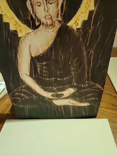 Buddha on wood