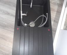 Black quartz sink and tap