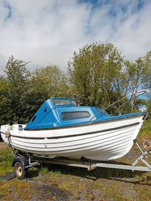 17ft weekend boat with trailer and engine