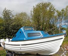 17ft weekend boat with trailer and engine