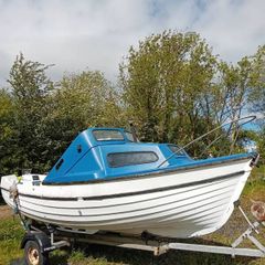 17ft weekend boat with trailer and engine
