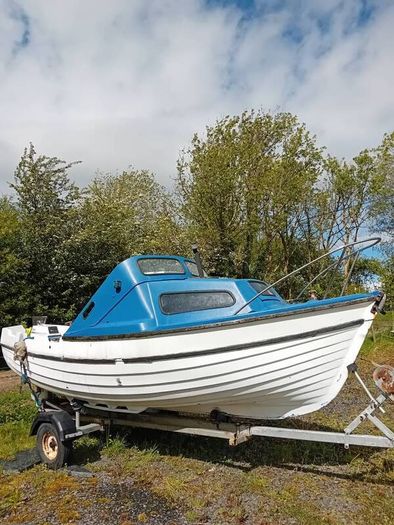 17ft weekend boat with trailer and engine