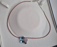 Swarovski crystal blue dog corded necklace very good condition