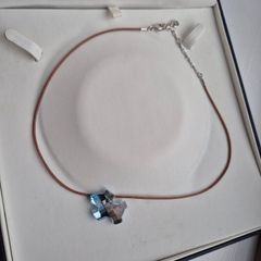 Swarovski crystal blue dog corded necklace very good condition