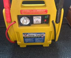 Portable 12 volt 4 in 1 jump starter.