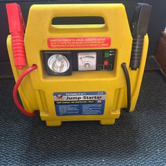 Portable 12 volt 4 in 1 jump starter.