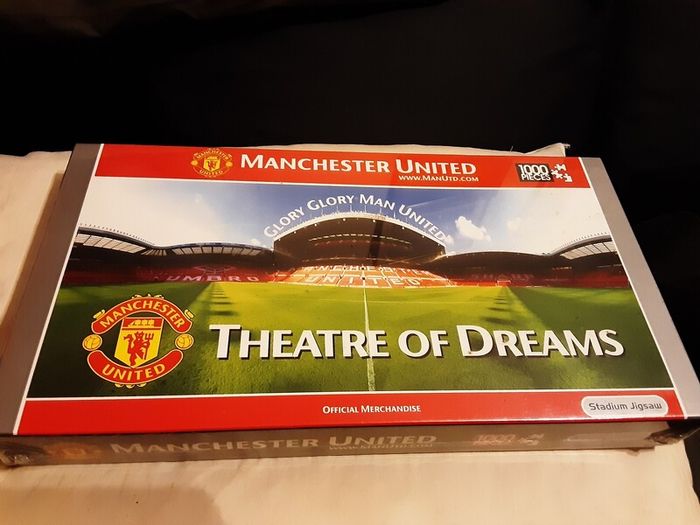 selection of unopened man united jigsaws
