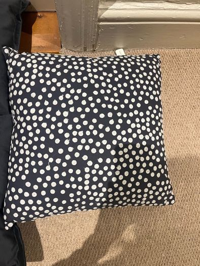 3 grey Scandi style cushions