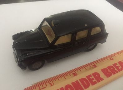 Spot-on. Tri-ang. Austin Taxi FX4.