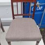 Two vintage mahogany dining chair with a pediment-style top rail, turned spindle back and turned front legs seat in a textured gray fabric Image 3