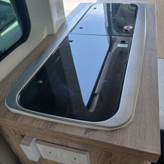 Camper conversion unit Includes Dometic  sink and 2 ring hob.It comes with fresh water and waste water  bottles.Does NOT include the Gas bottle or regulator or pump.Only used two weekends.