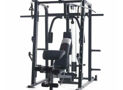 Smith machine rack with plate loaded cables