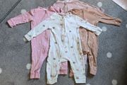 4 x Double zipper Footless Sleepsuits (9-12 months)