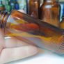 485 - Set of 5 Vintage Brown Amber Glass Screw Top Collectible Decorative Bottles Image 5