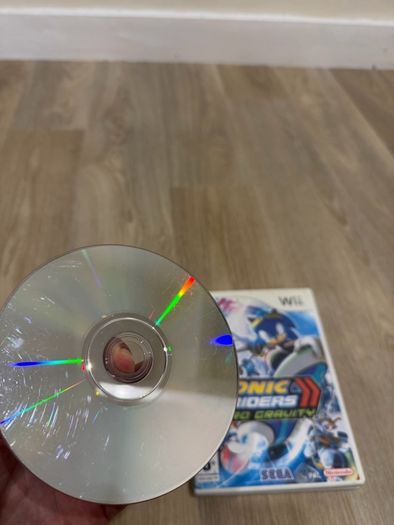 Wii games bundle - Mario bros Wii, Smash Bros Brawl, and Sonic Riders