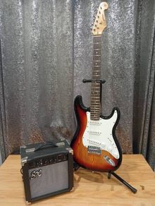 SX Stratocaster guitar and amp