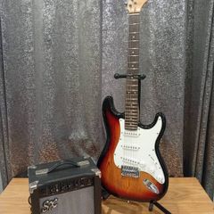 SX Stratocaster guitar and amp