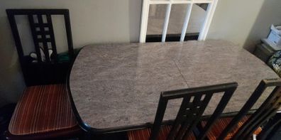 extendable table and 6 chairs