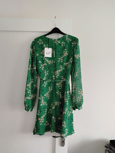 Green dress with floral detail