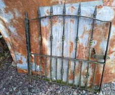: Antique wrought iron garden gate.