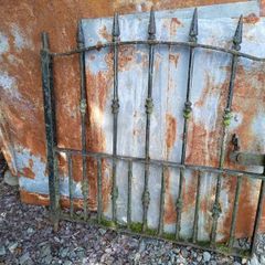 : Antique wrought iron garden gate.