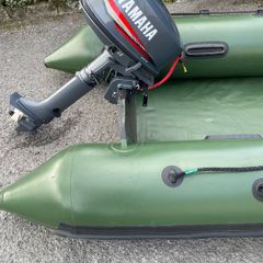 Outboard engine and inflatable boat