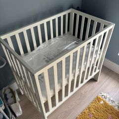 mamas and papas petit cot and fibre mattress.