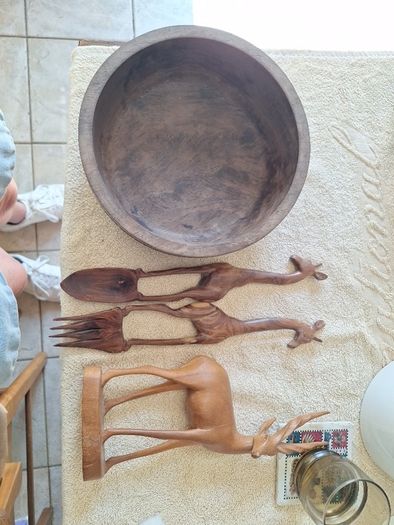 African wooden salad bowl and servers and antelope carving