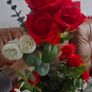 Red and white flowers in vases Image 4