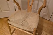 Set of two Meadows and Byrne oak wishbone chairs