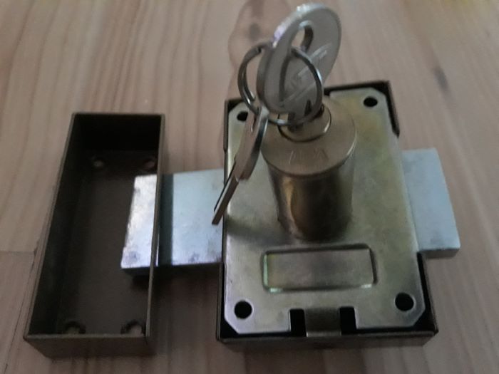 Double turn lock door