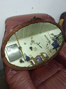 Antique oval mirror with original hanging chain