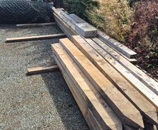 Three rail fencing with posts, stakes and chainlink fencing