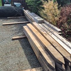 Three rail fencing with posts, stakes and chainlink fencing