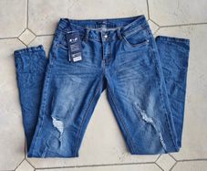 Blue ripped skinny jeans