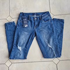 Blue ripped skinny jeans